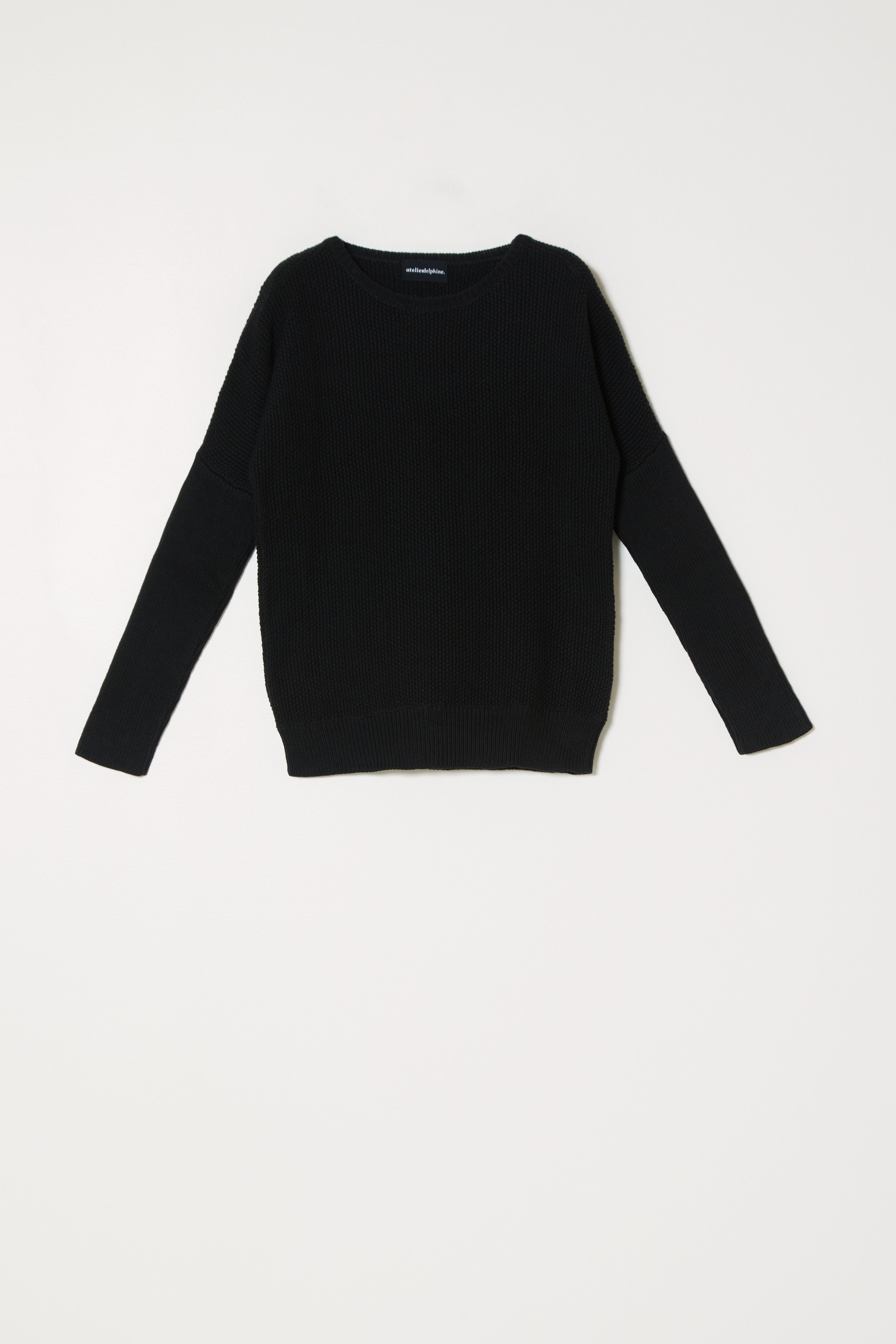 ドルマンスリーブトップス