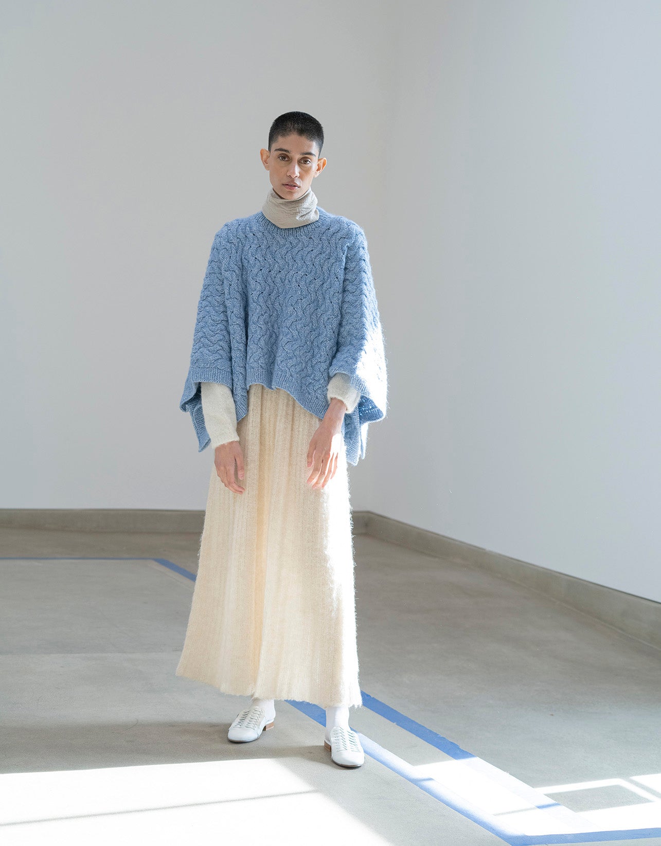 Cable hand knit poncho